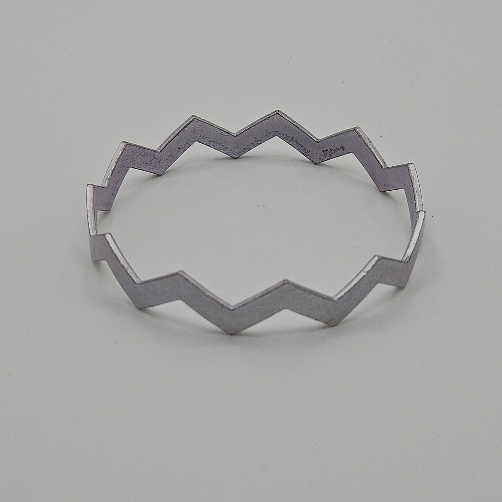 brushed silver tone chevron bangle